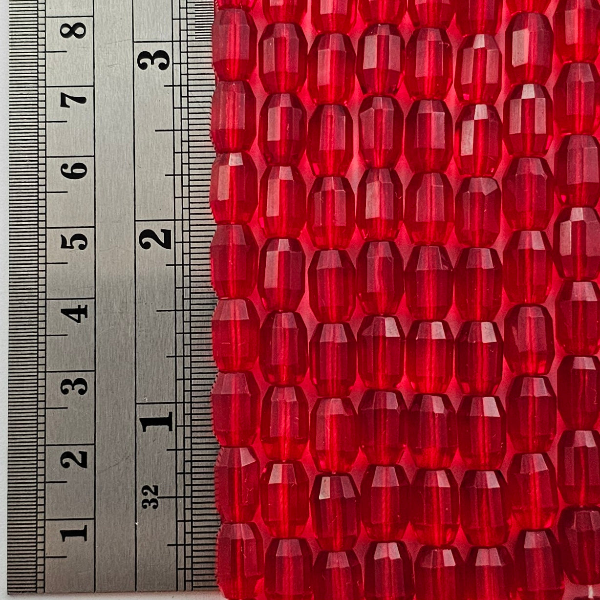 10x7mm - Ruby - Oval Barrels Fire Polished Czech Glass