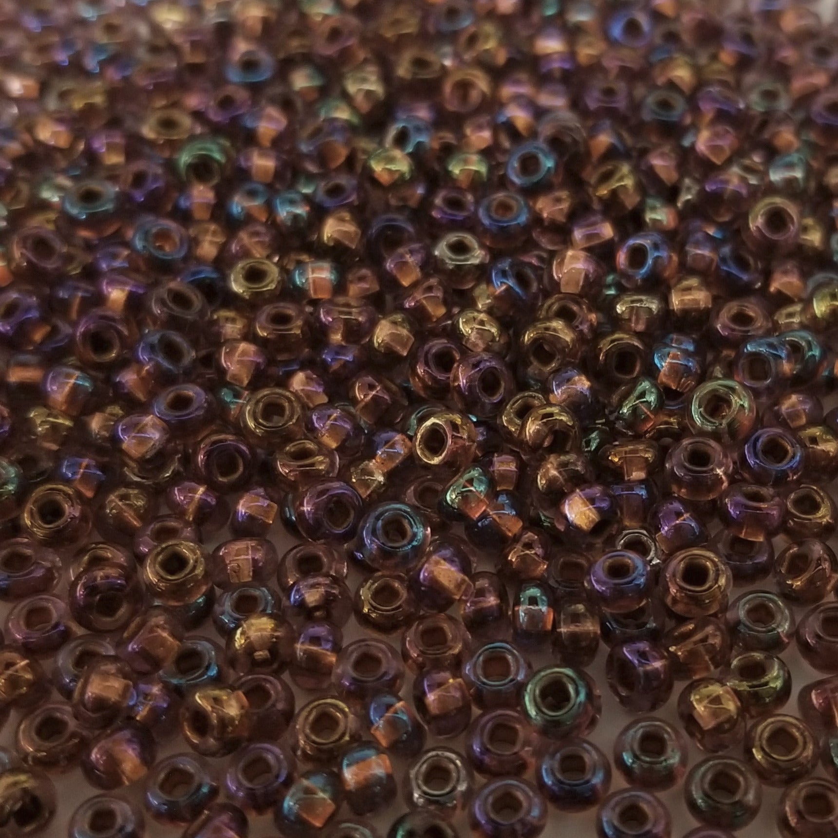 Lt Amethyst Copper Lined Rainbow - Size 6/0 #882