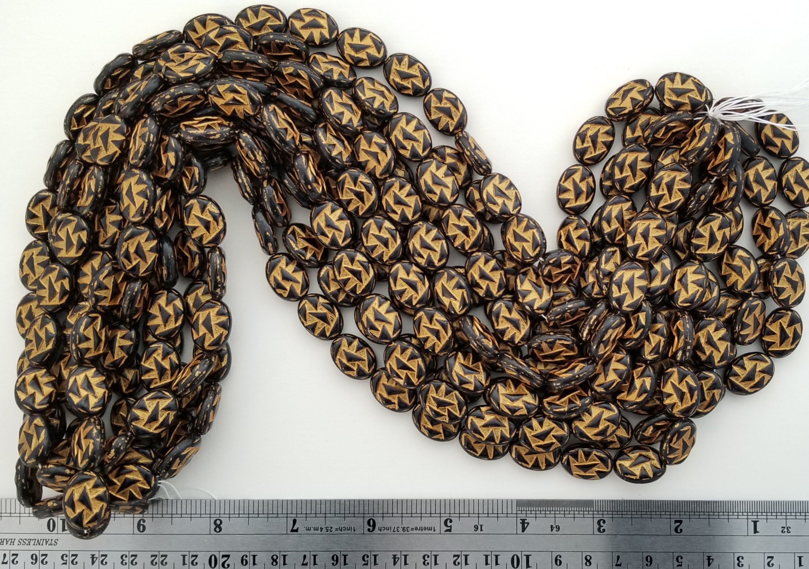 17x13mm Black and Gold Ovals with Triangle Pattern - 25 Beads