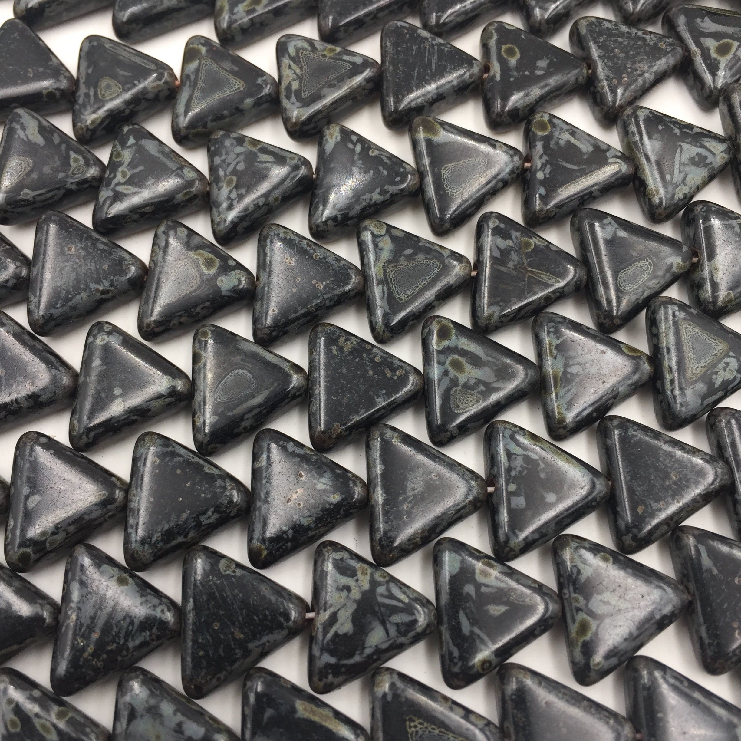 12mm Black Travertine Triangles