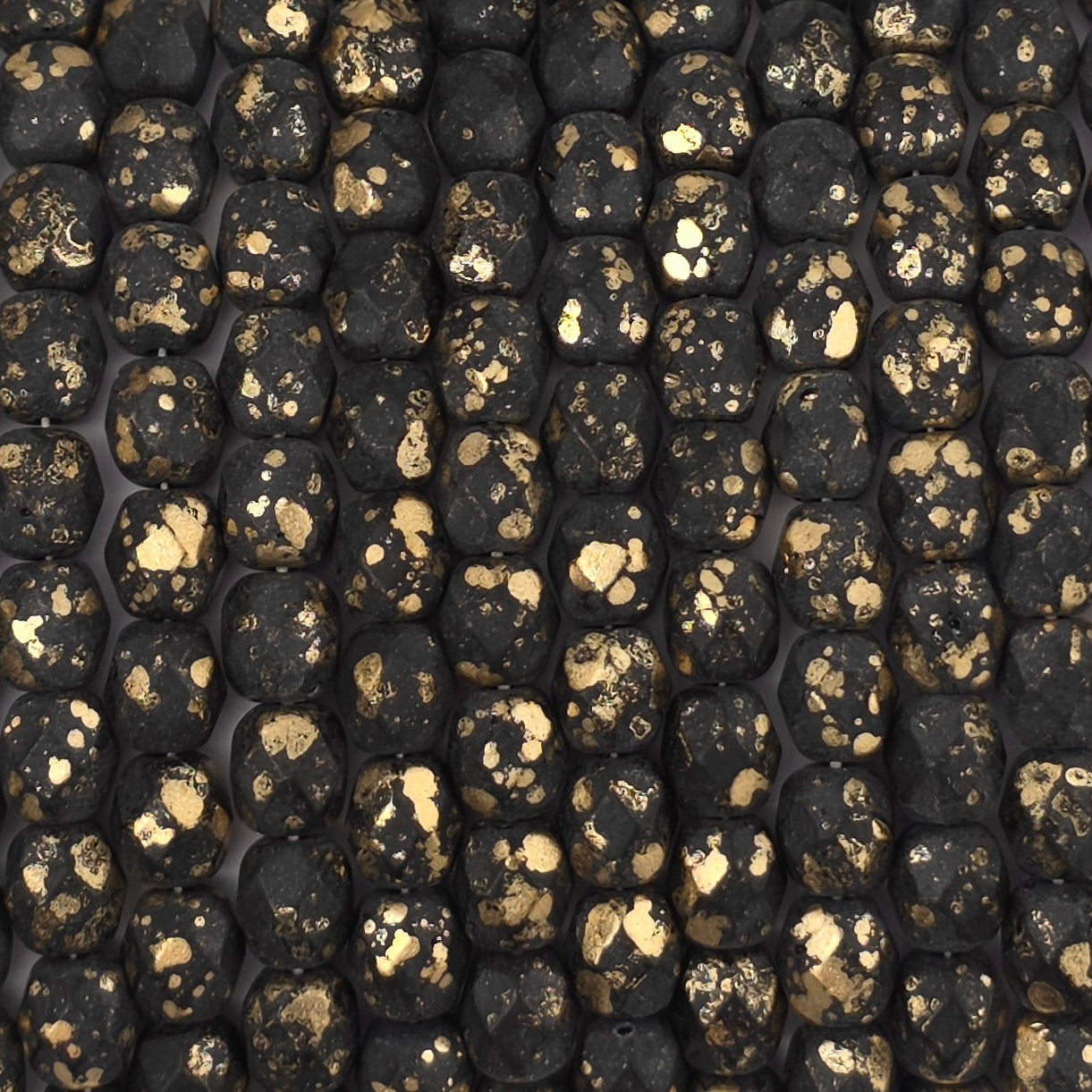 6mm - Black Matte Gold Speckle - Fire Polished