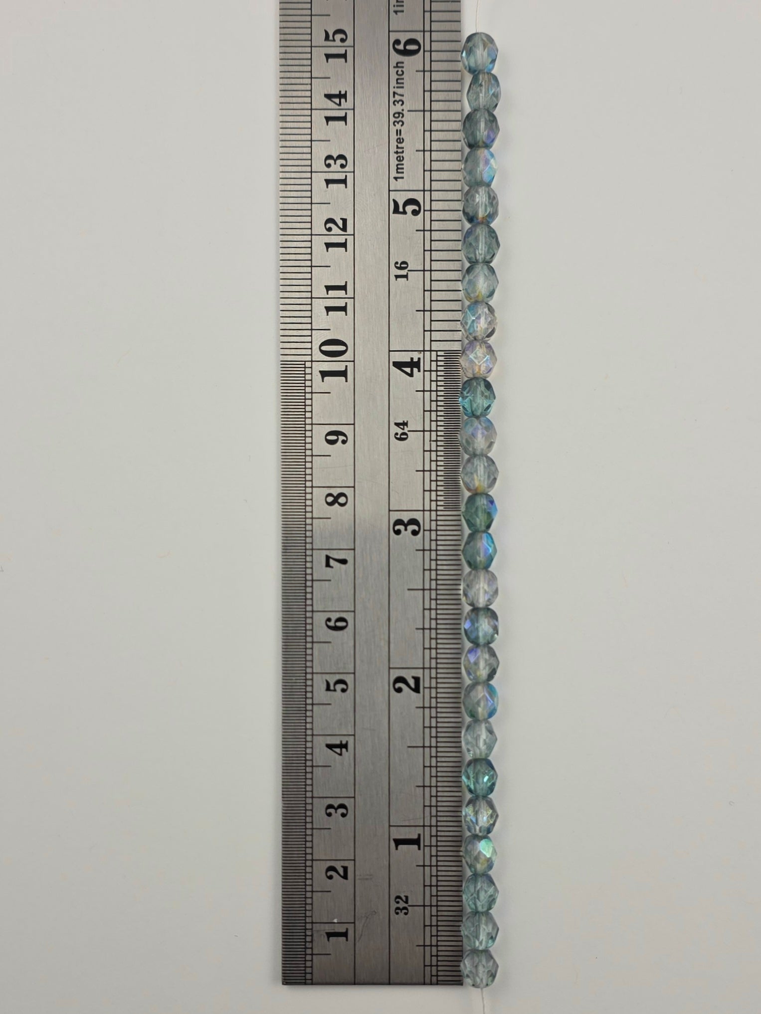 6mm - Crystal with Blue Green AB Luster - Fire Polished