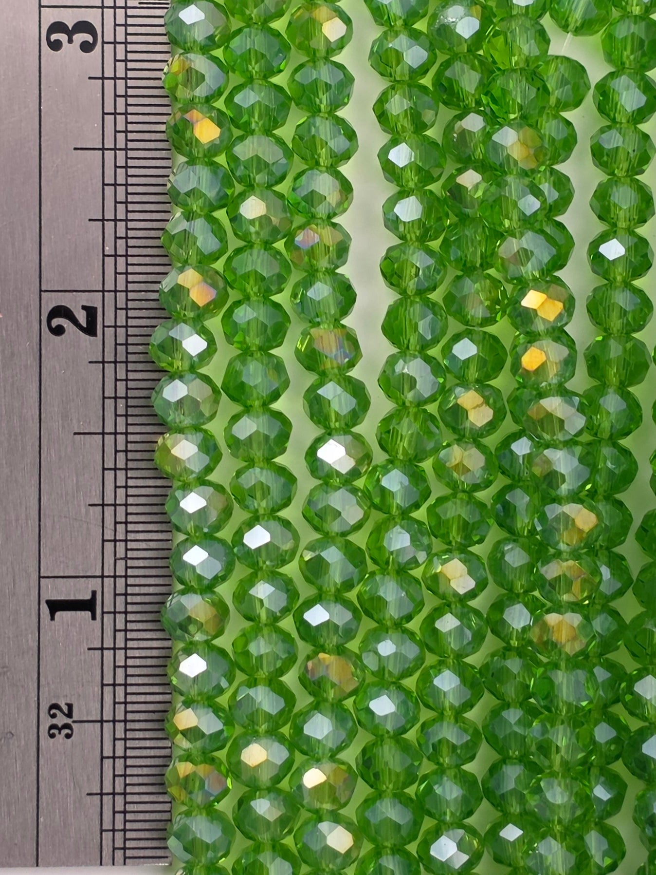 5x6mm - Crystal Rondelles - Green Transparent with Rainbow Luster