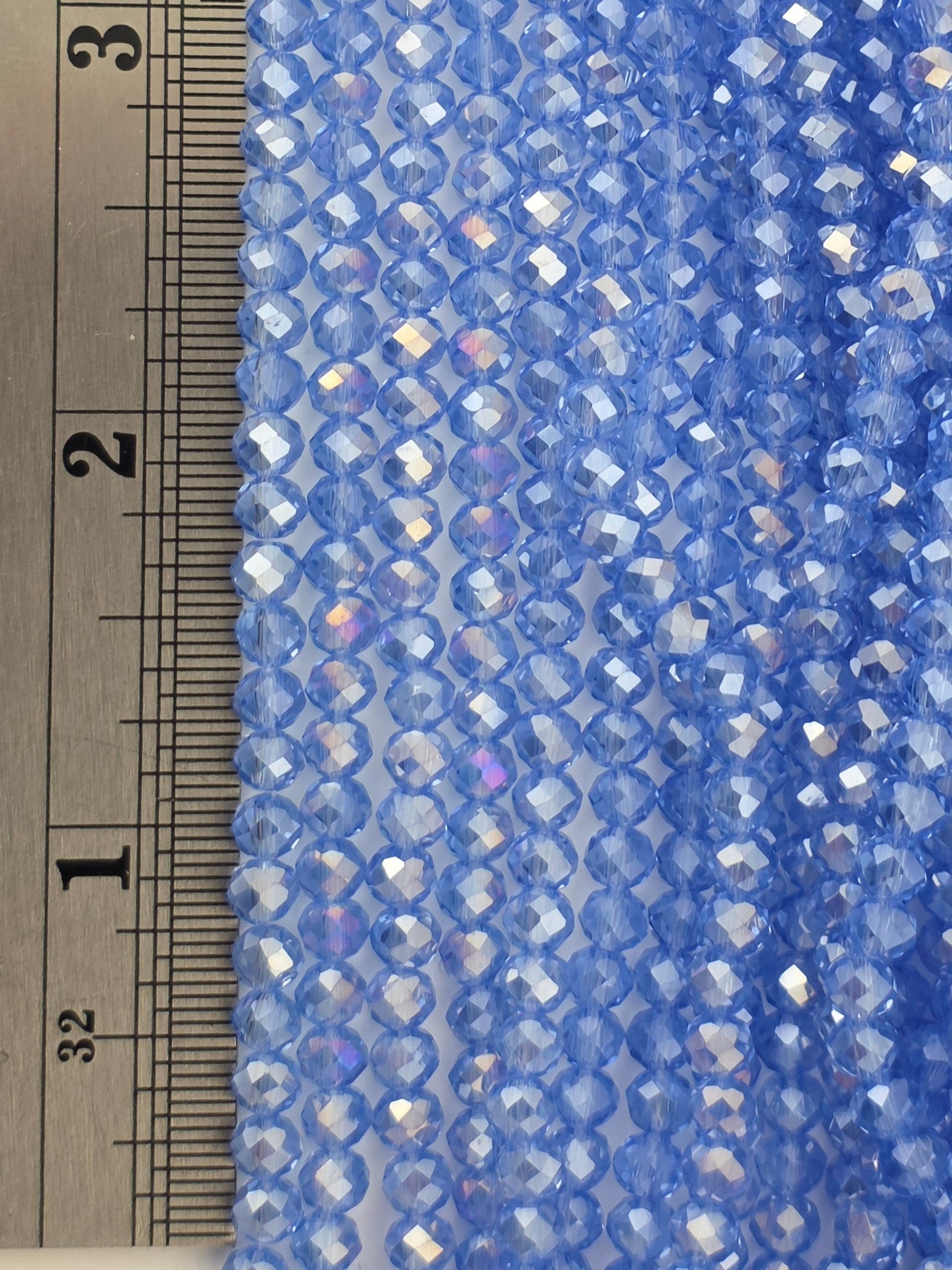 3x4mm - Crystal Rondelles - Light Sapphire with Rainbow Luster