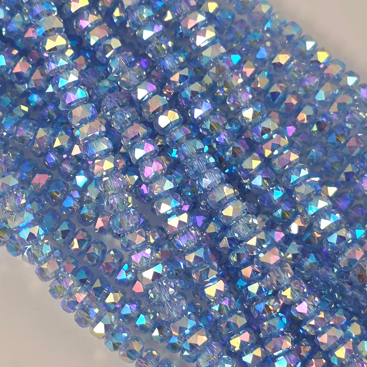 3x4mm - New Cut Crystal Rondelles - Light Sapphire AB