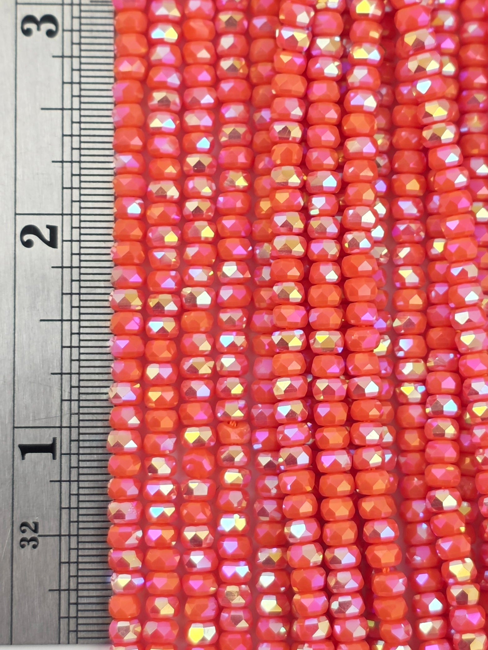 3x4mm - New Cut Crystal Rondelles - Orange Opaque AB