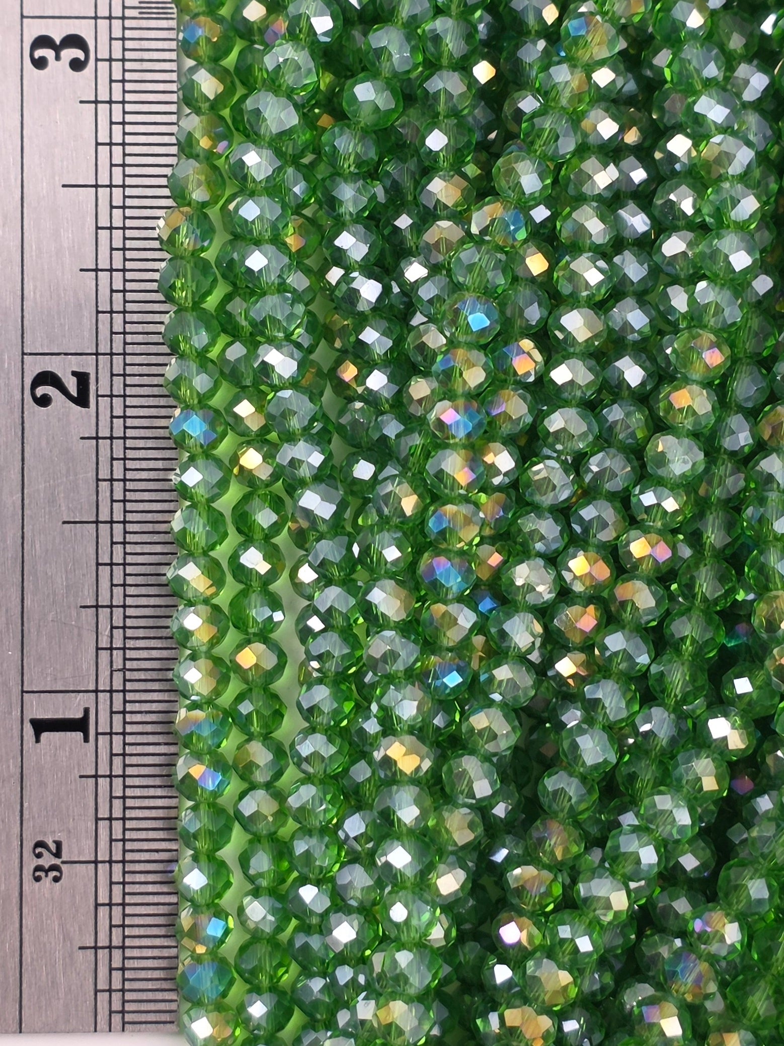 3x4mm - Crystal Rondelles - Green Transparent with Rainbow Luster