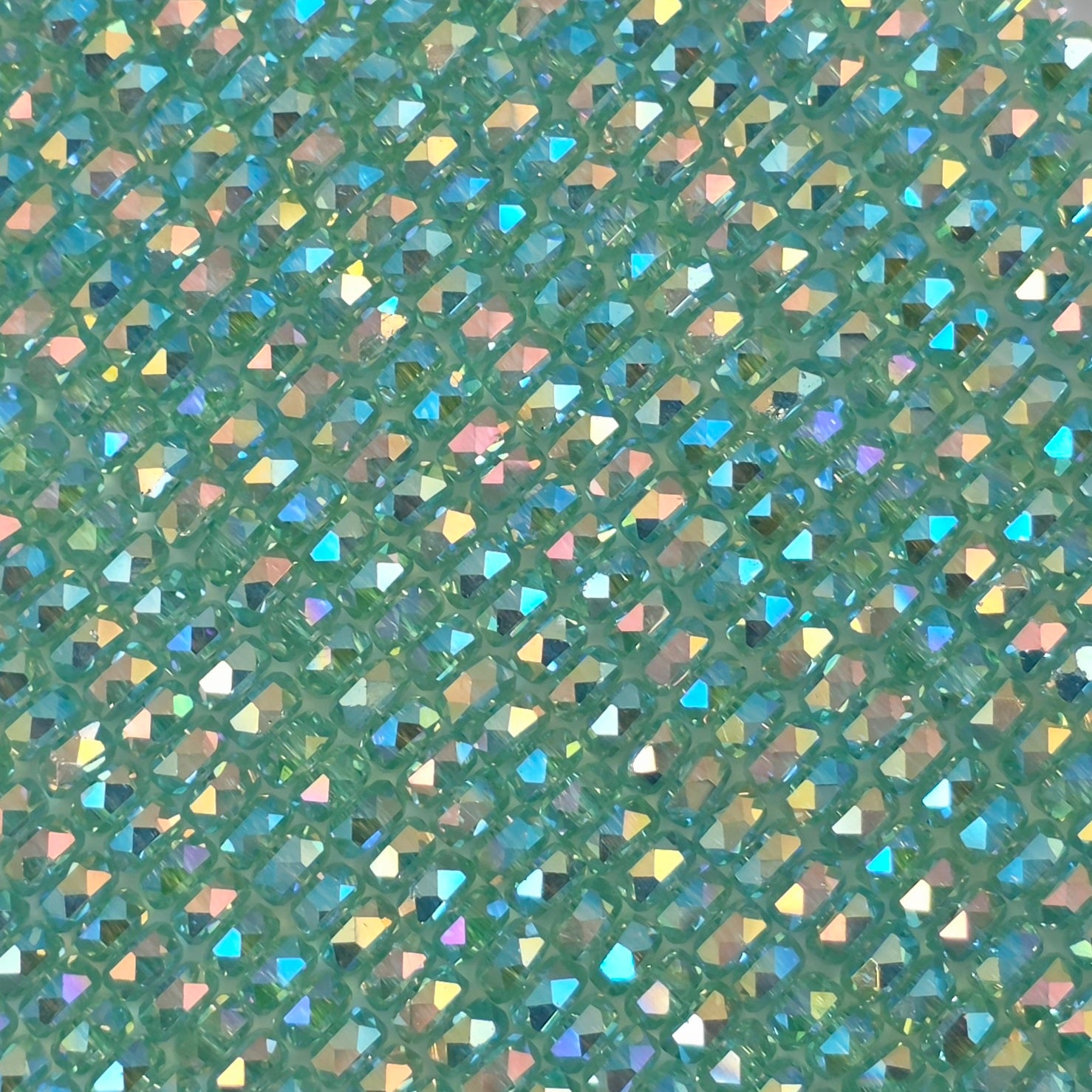3x4mm - New Cut Crystal Rondelles - Pale Green AB