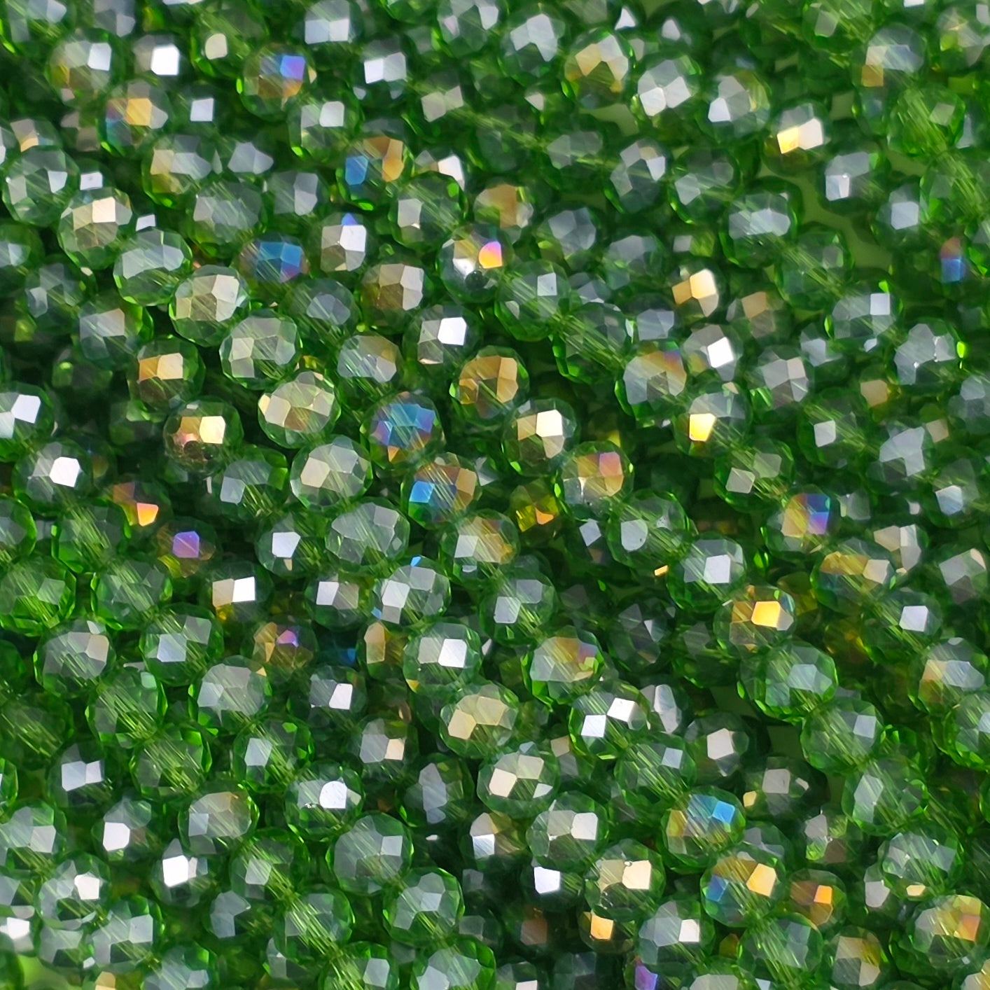 3x4mm - Crystal Rondelles - Green Transparent with Rainbow Luster