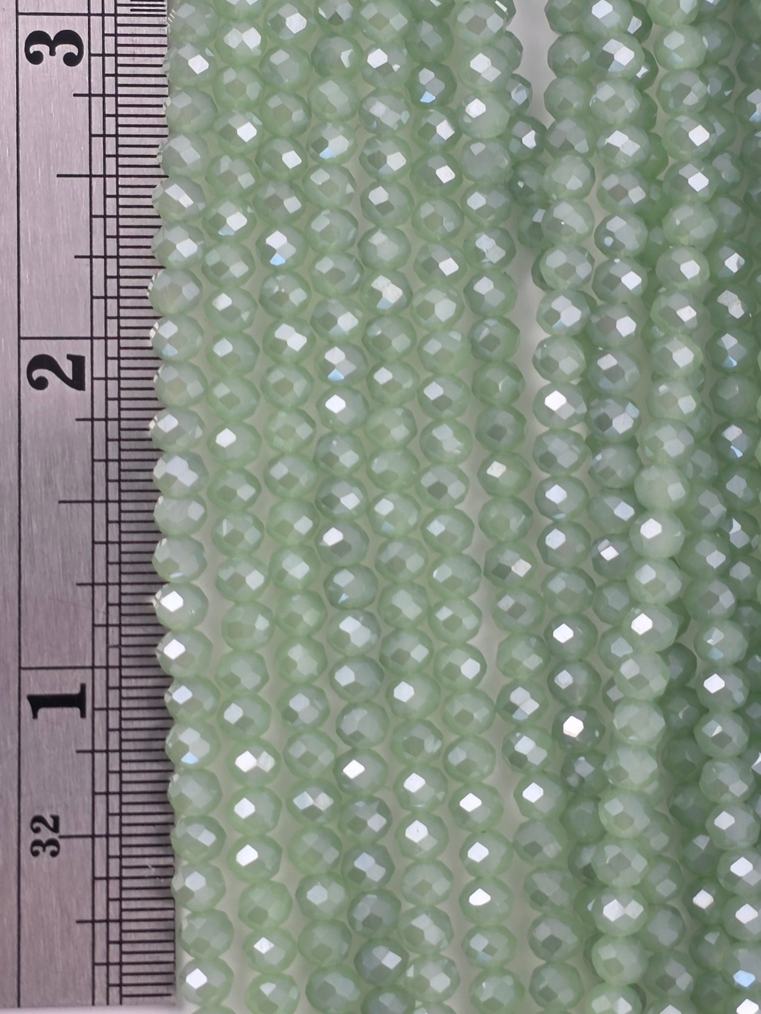 3x4mm - Crystal Rondelles - Mint Opal Luster