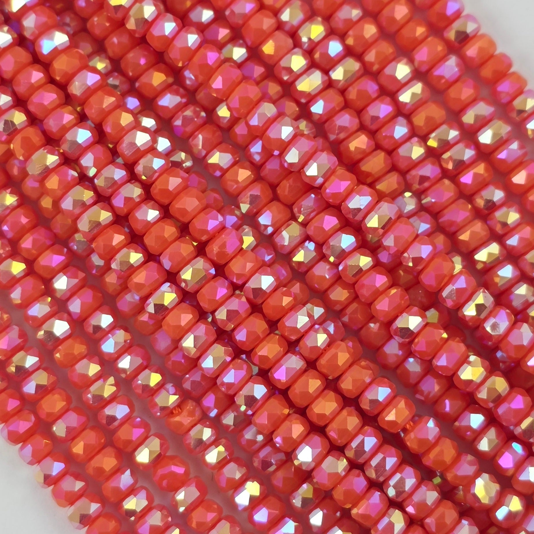 3x4mm - New Cut Crystal Rondelles - Orange Opaque AB