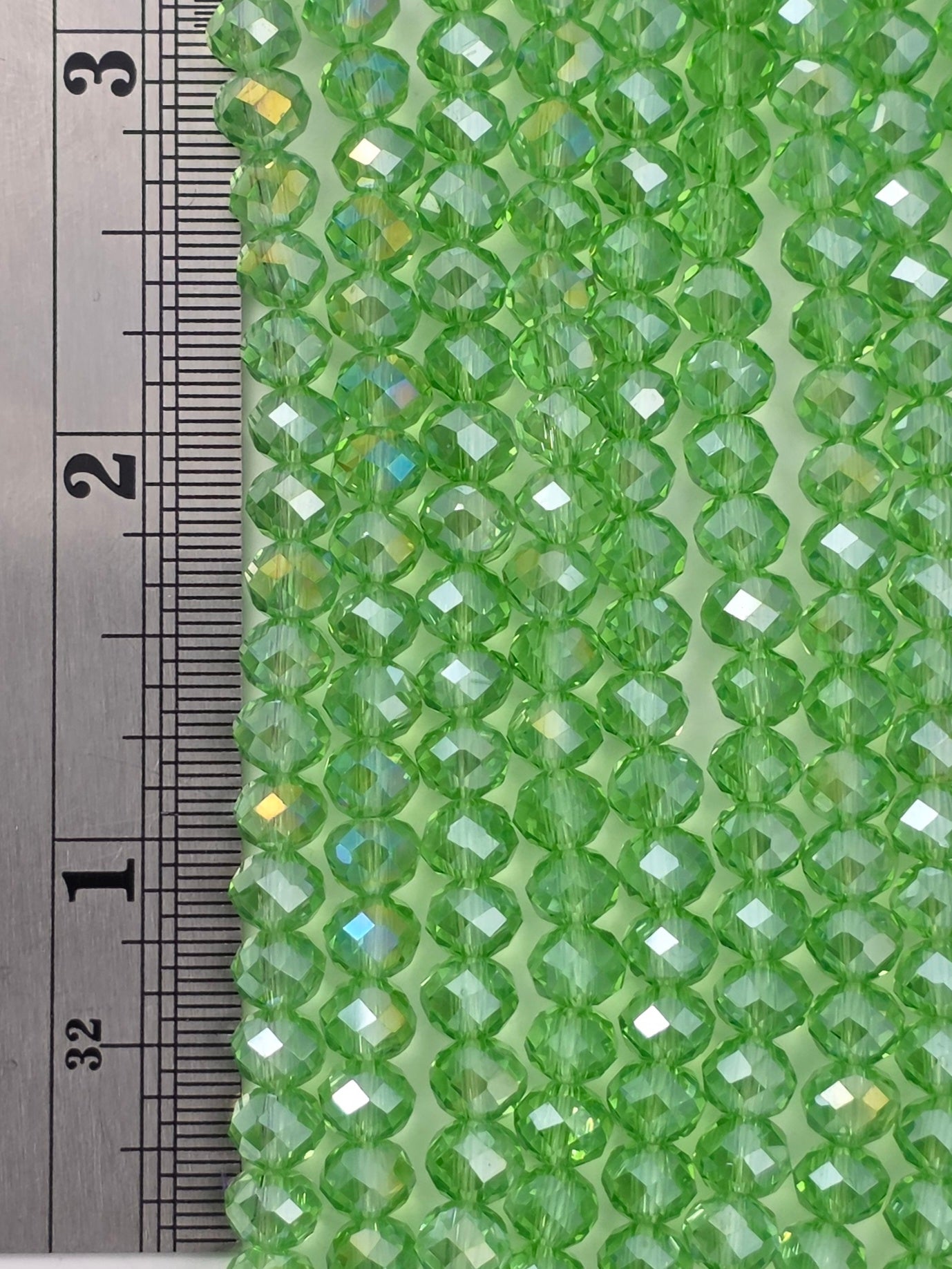 5x6mm - Crystal Rondelles - Peridot with Rainbow Luster