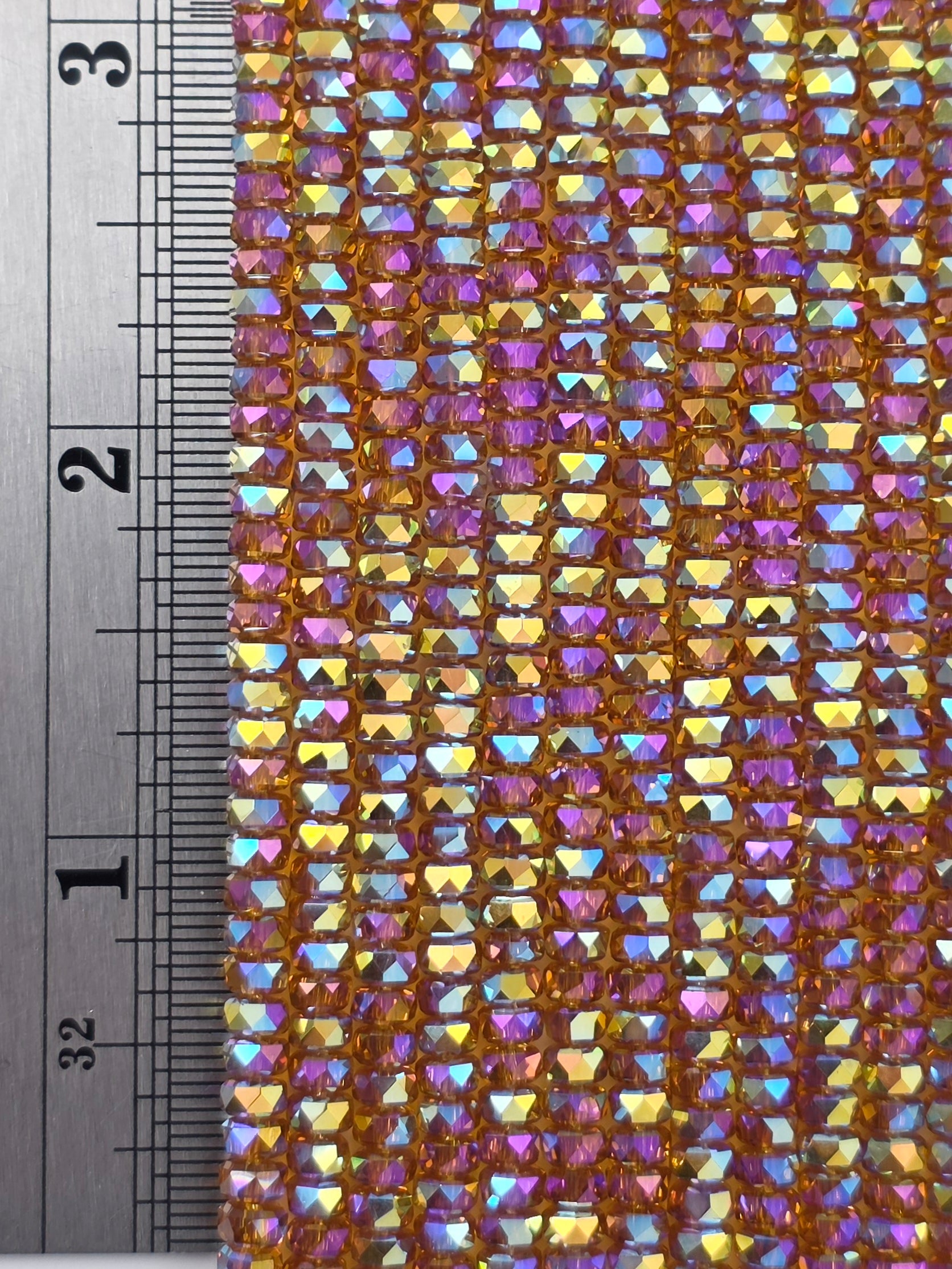 3x4mm - New Cut Crystal Rondelles - Topaz AB