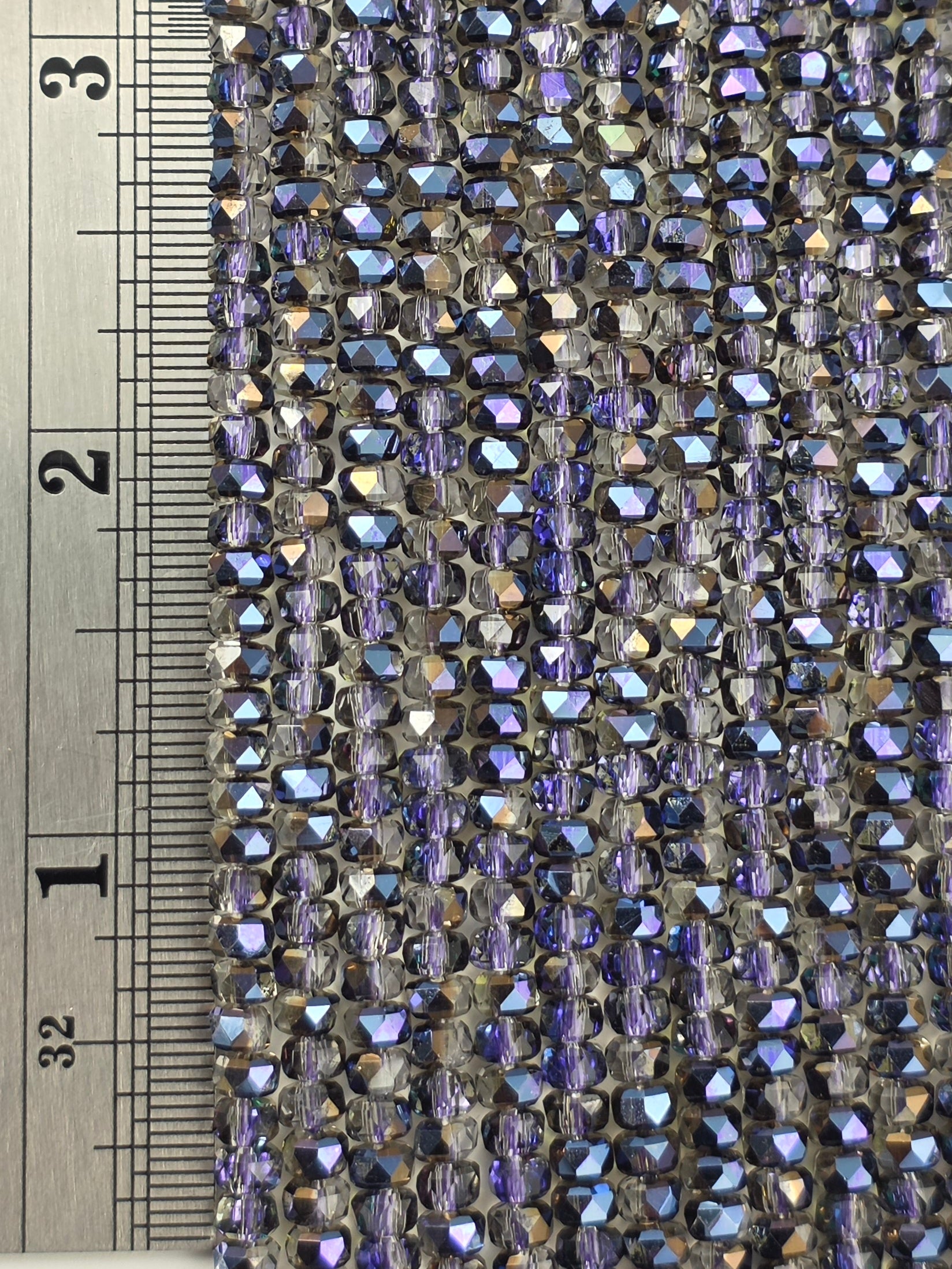 3x4mm - New Cut Crystal Rondelles - Black Diamond with Purple Luster