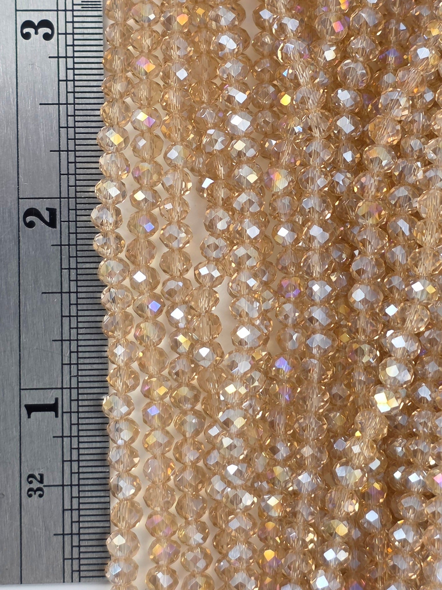 3x4mm - Crystal Rondelles - Champagne with Rainbow Luster