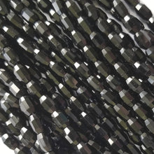7x5mm - Black - Oval Barrels - Fire Polished Czech Glass