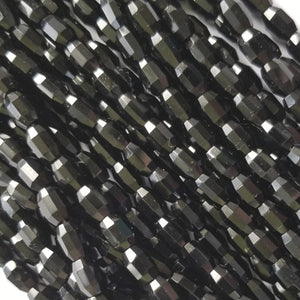 7x5mm - Black - Oval Barrels - Fire Polished Czech Glass