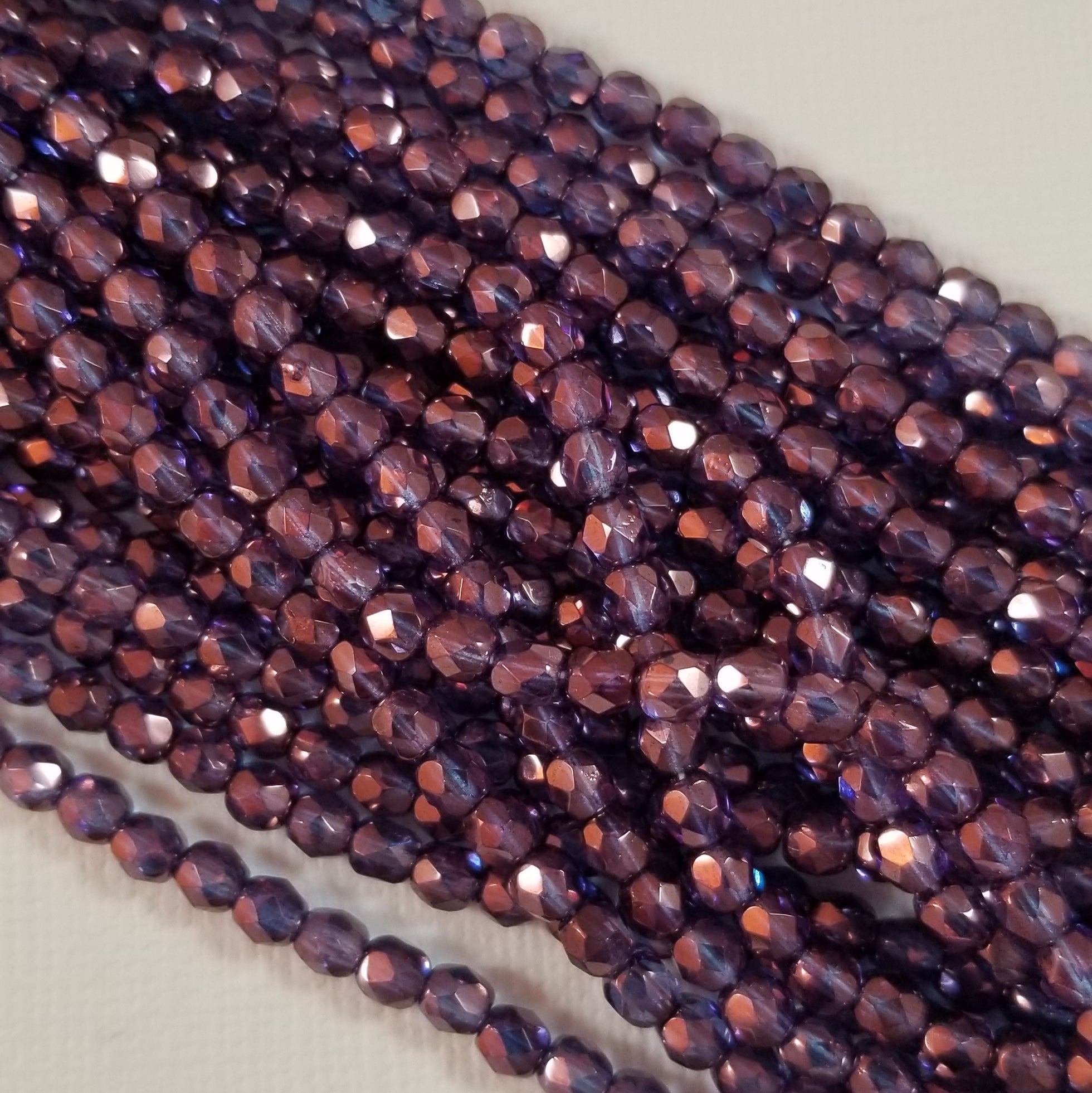 4mm - Crystal with Violet Luster- Fire Polished